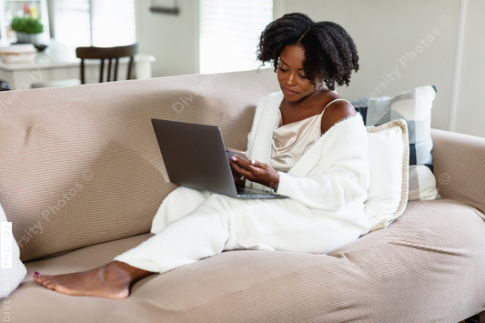 Black woman cozy, working from home