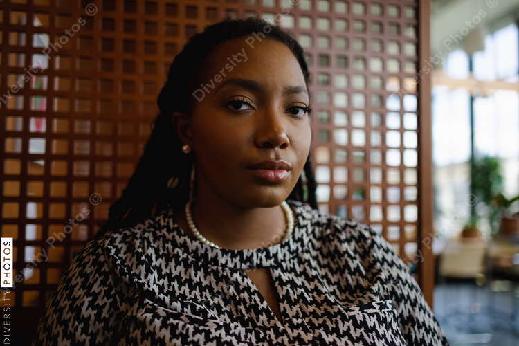 Portrait of Black woman, business, focused with copy-space 