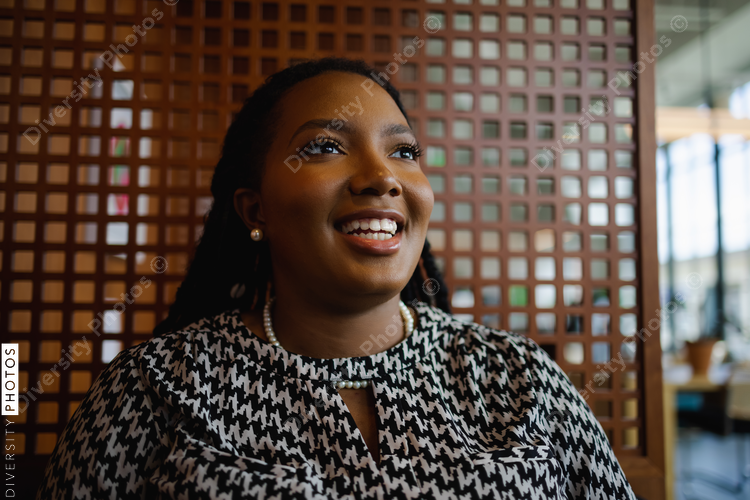 Portrait of Black woman, business, visionary, motivated,happy, smiling with copy-space , confident