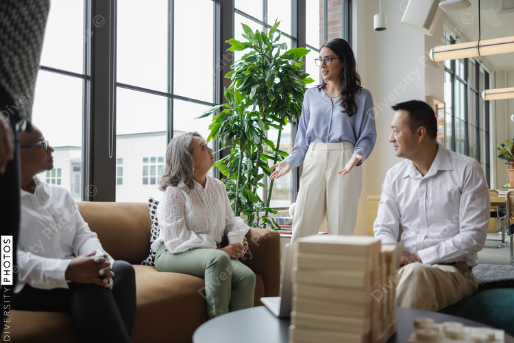 Diverse Business team meets in office, Middle Eastern woman leadership 