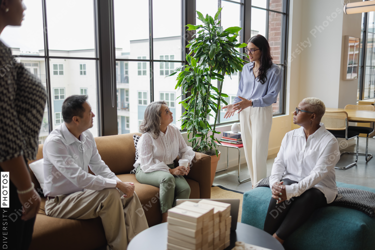 Diverse Business team meets in office, Middle Eastern woman leadership 