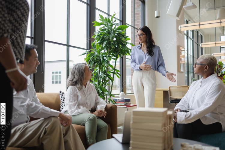 Diverse Business team meets in office, Middle Eastern woman leadership 