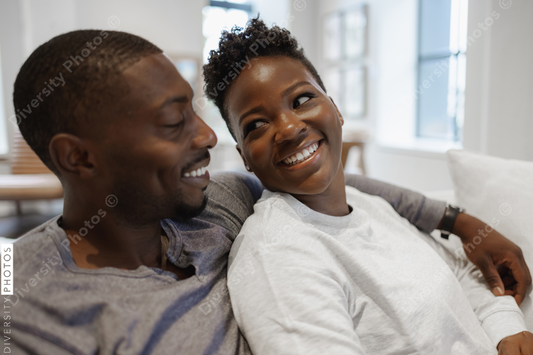Black Couple smiling and embracing