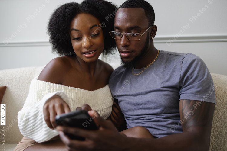 Couple using smart phone