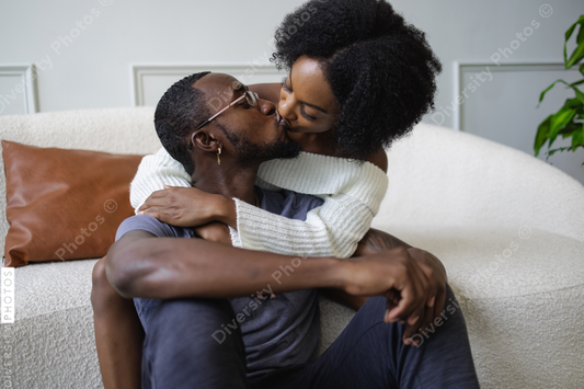 Young Couple kissing in living room