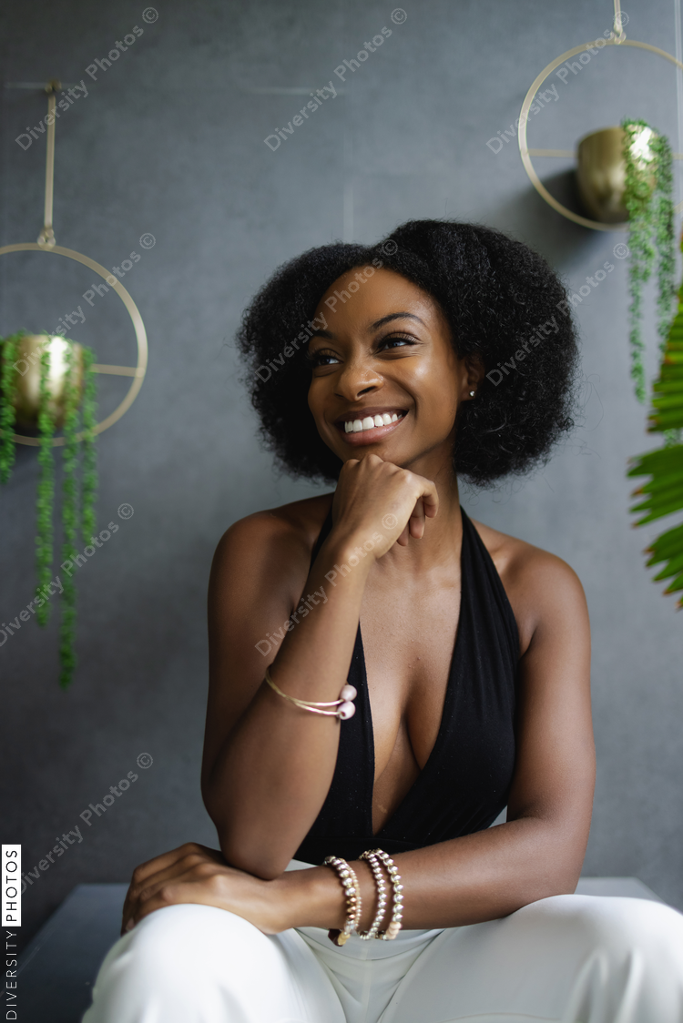 Smiling young woman in elegant clothes