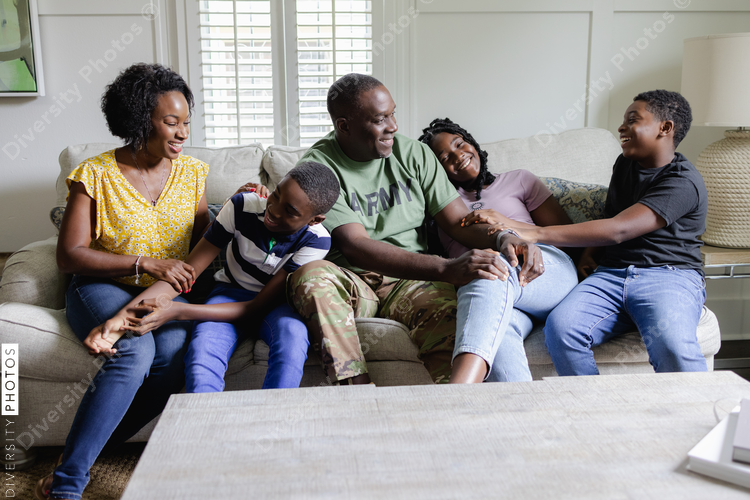 African American family portrait at home on sofa
