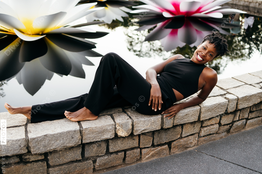 African American woman laying down relaxing, serene