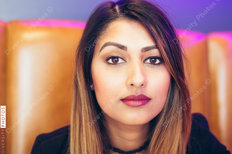 Portrait of young businesswoman sitting in office