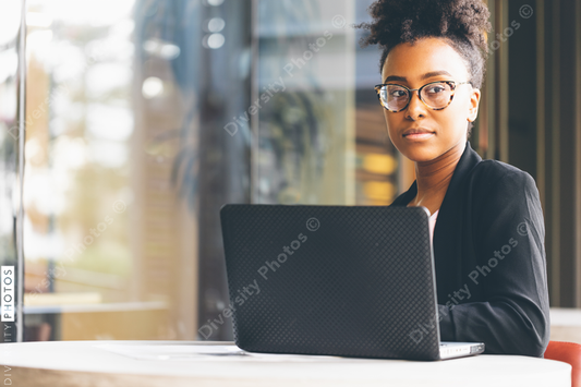 Young businesswoman sitting in office