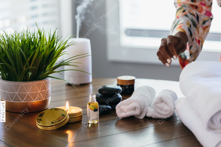Black woman relaxing and meditating at home