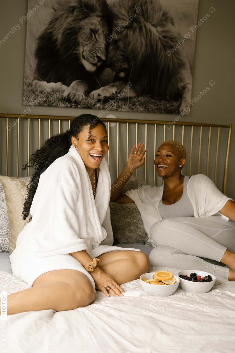 Friends having a girls weekend relaxing at house