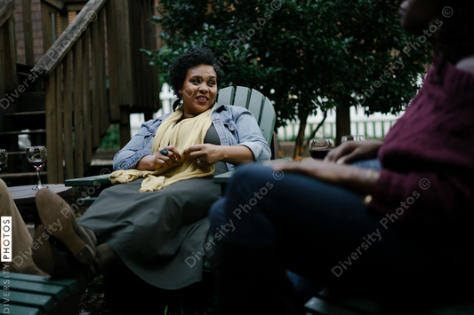 Black friends safely gathered at backyard kickback party