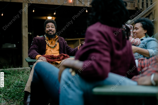 Black friends safely gathered at backyard kickback party