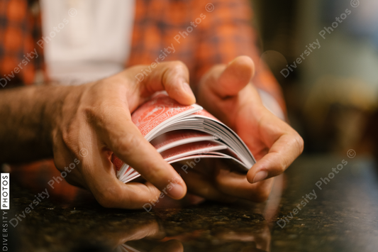 African American friends together playing card games