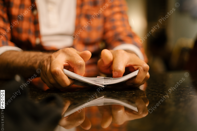 African American friends together playing card games