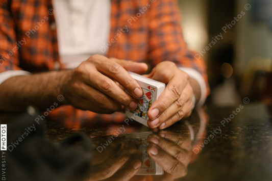African American friends together playing card games