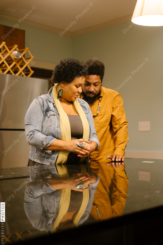 African American friends together playing card games