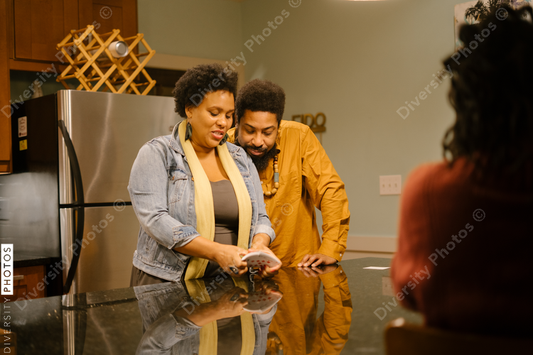 African American friends together playing card games