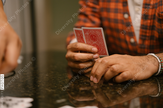 African American friends together playing card games