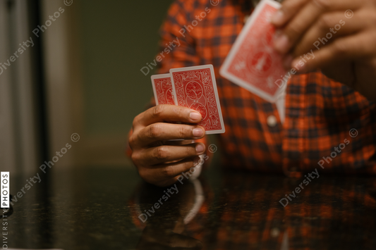 African American friends together playing card games