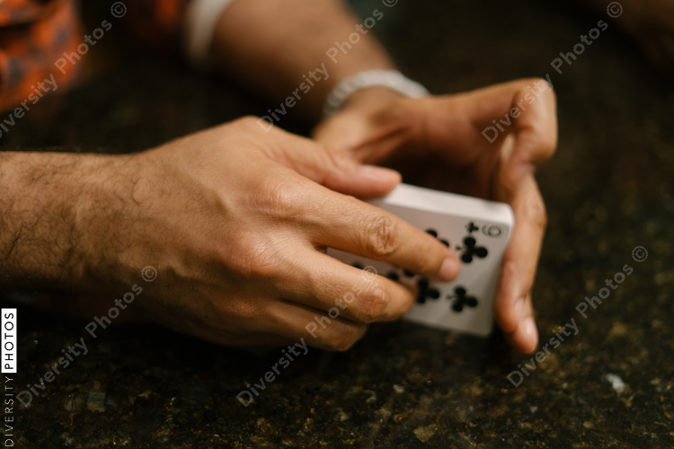 African American friends together playing card games