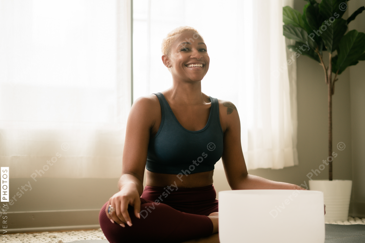 Black woman meditating at home