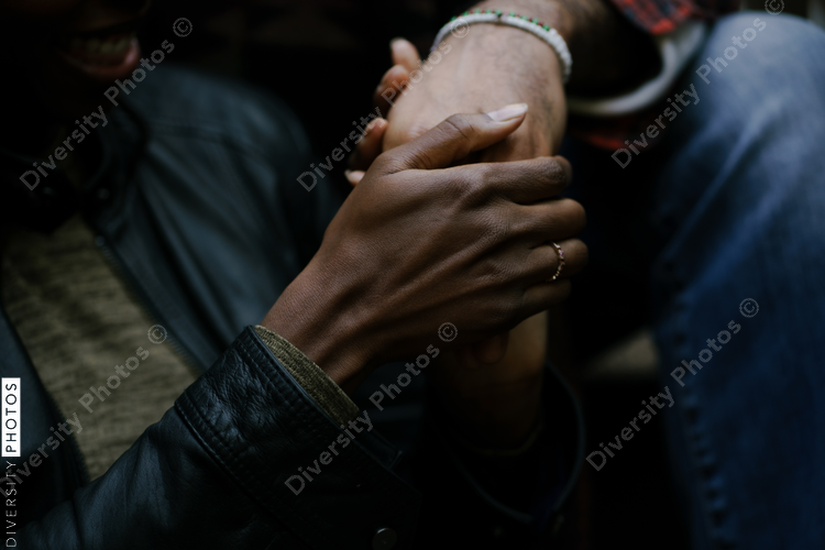 Man and wife holding hands and cherishing their partner