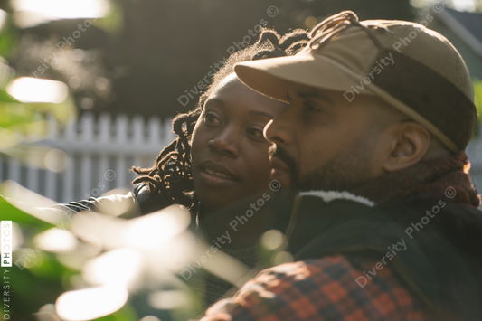 Beautiful black couple outside home at sunrise