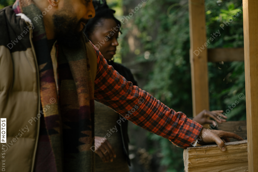 Black man getting firewood for fire-pit