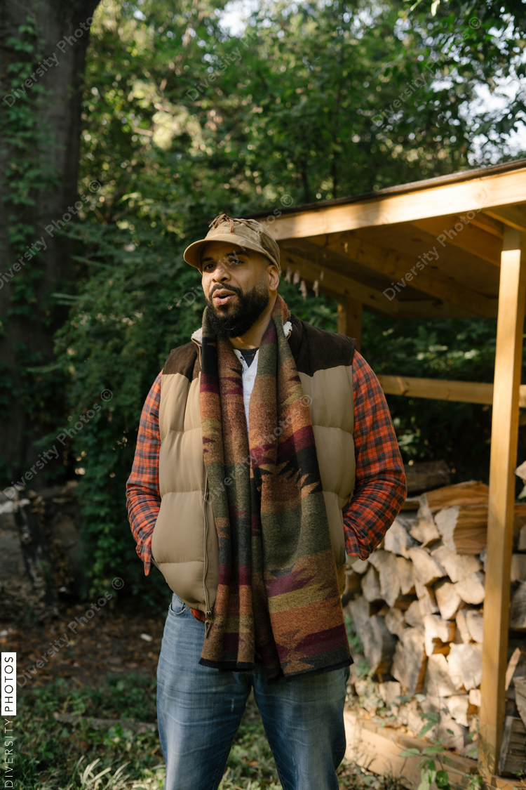 Black man getting firewood for fire-pit