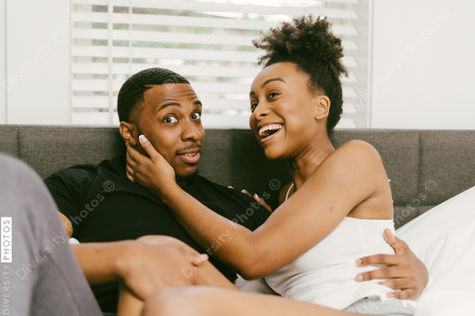 Young couple, boyfriend shocked and girlfriend laughing