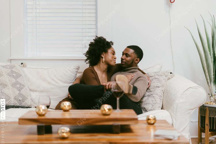 Intimate coversation, black couple at home
