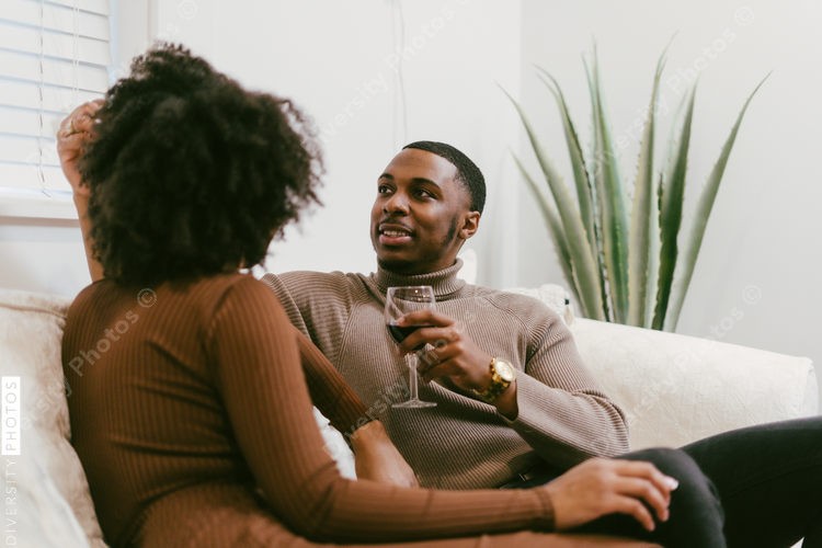 Intimate coversation, black couple at home