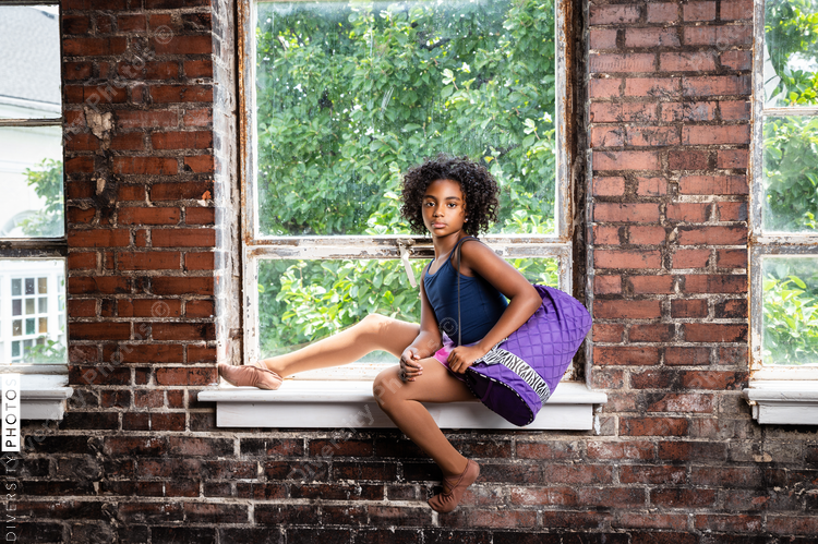 Portrait of young preteen female dancer, African American girl