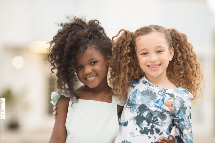 Portrait of smiling girls standing together