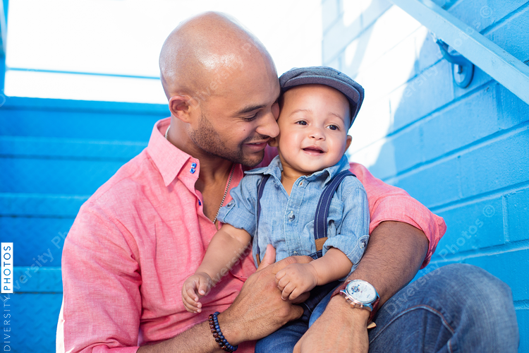 Father holding his baby son