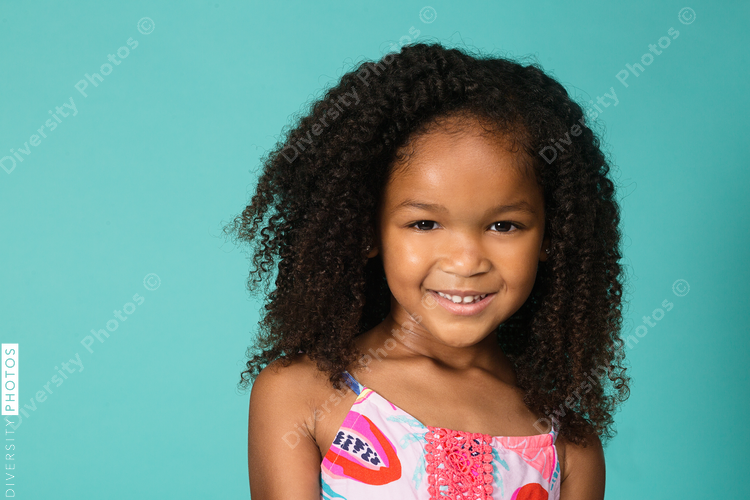 Portrait of smiling girl with natural hair
