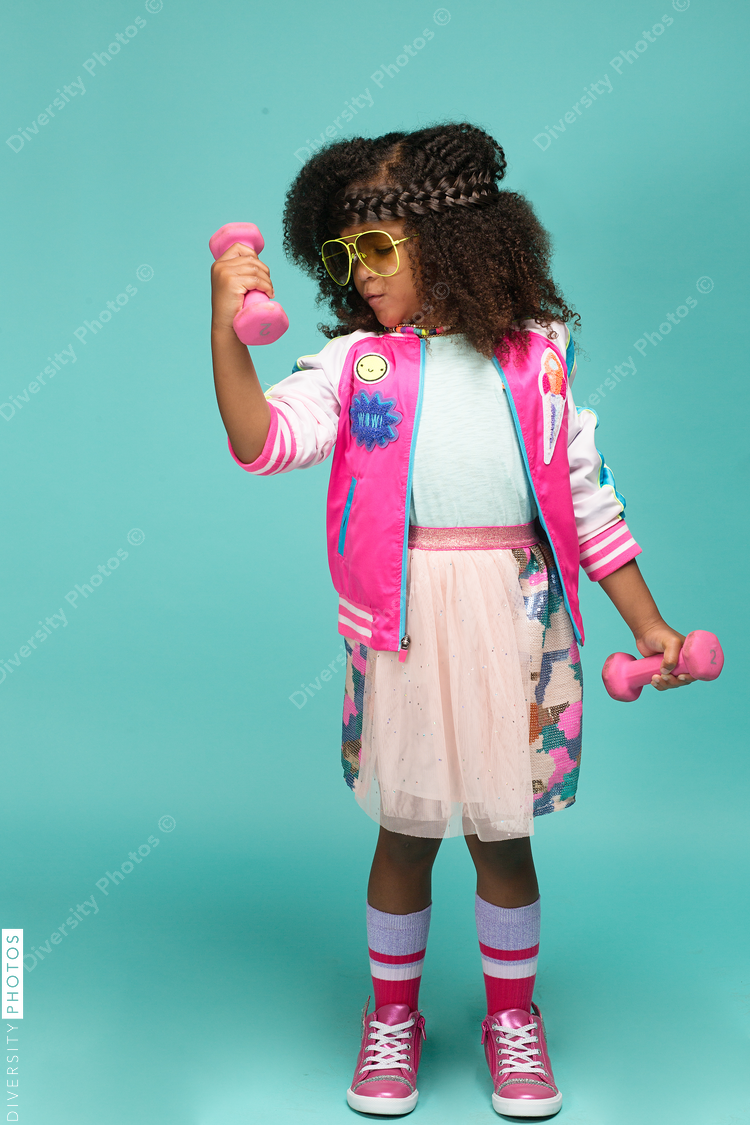Portrait of girl in workout clothes and tutu