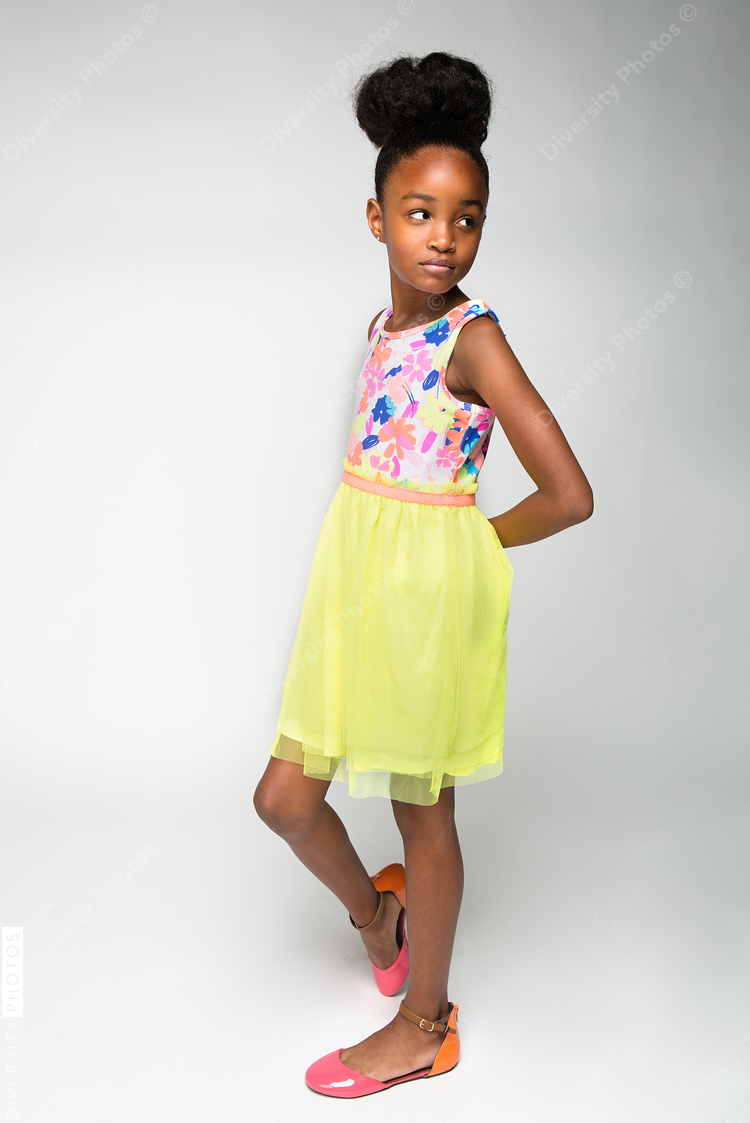 Girl standing against white background