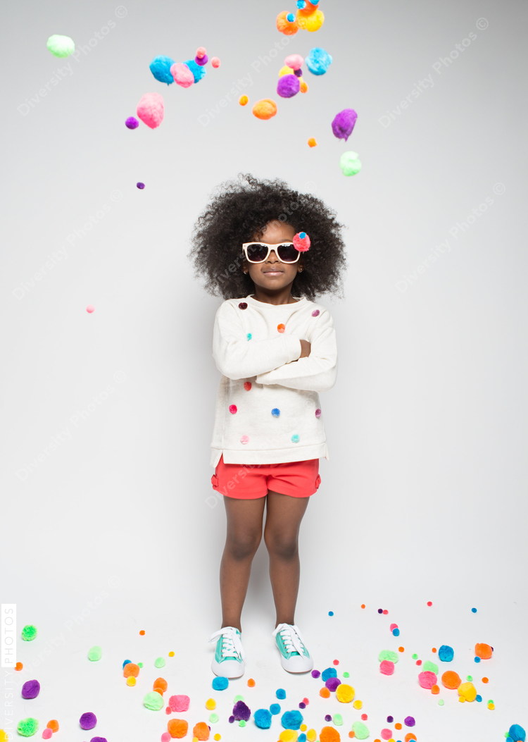 Girl standing against white background