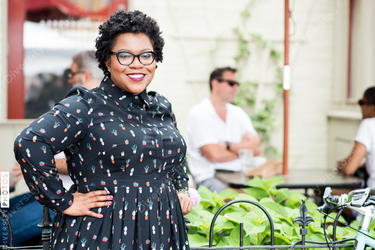 Portrait of smiling woman standing outdoors