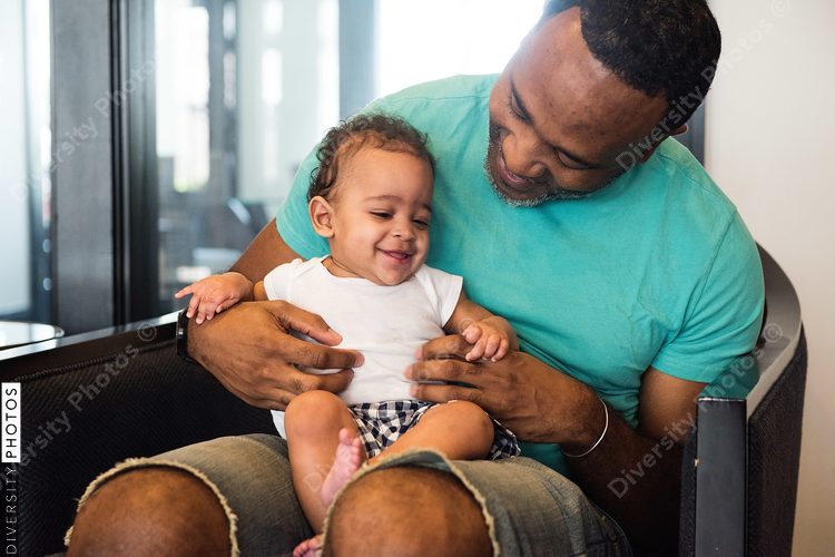 Father and son smiling