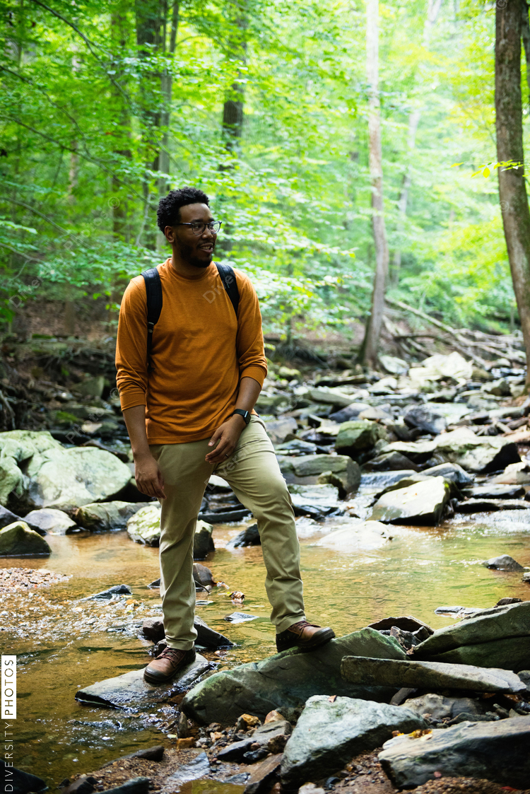 Man crosses shallow river