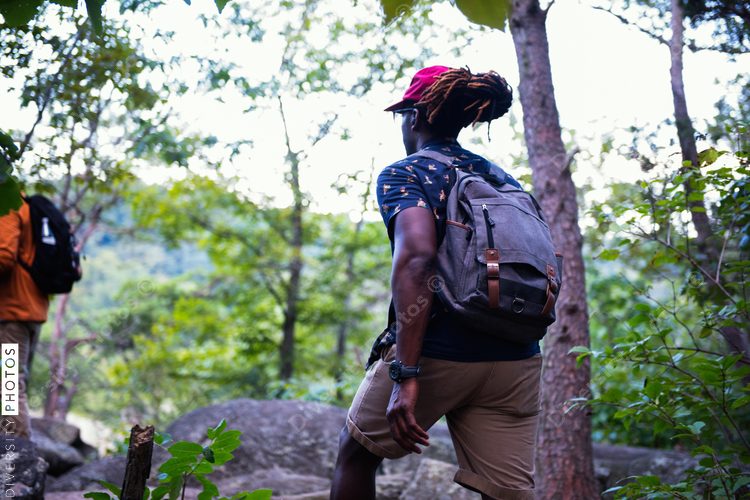 Diverse friends hiking mountain walking trail