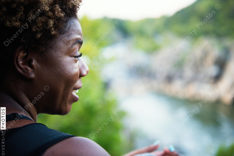 Woman enjoying mountaintop view