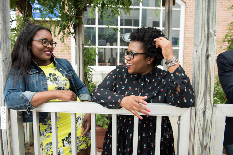Businesswomen talking with each other at party