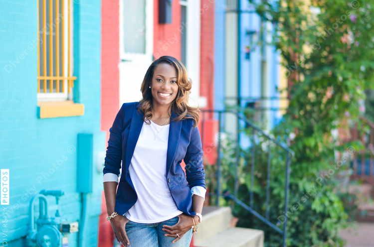 Portrait of smiling woman standing outdoors