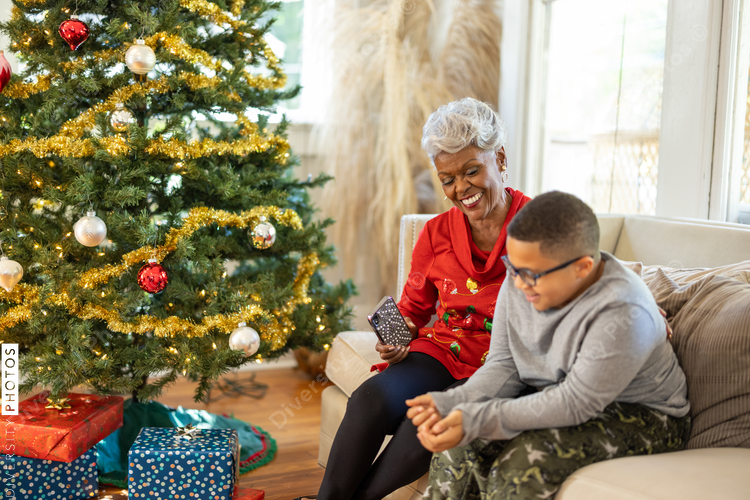 Grandmother and grandson talking in family room